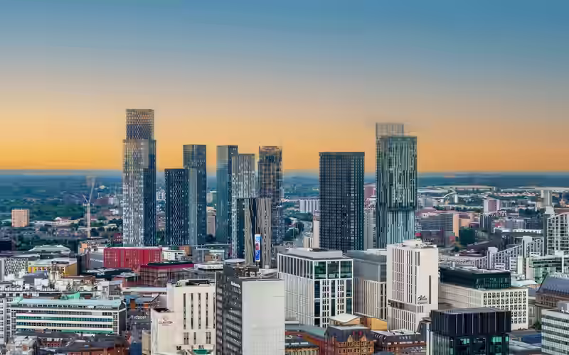 The Deansgate Square towers on Manchester's skyline at sunset